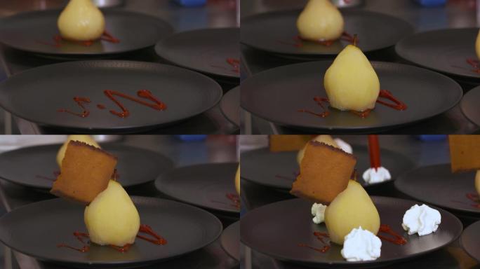 梨甜点和装饰用鲜奶油、冰淇淋和盘子里的蛋糕-特写视图-烹饪概念