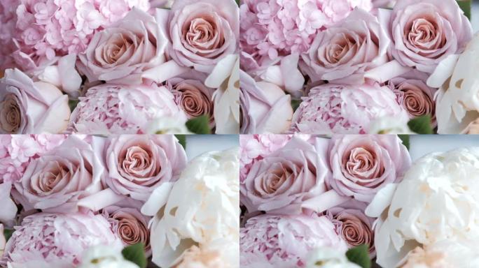 玫瑰花，牡丹和绣球花的新鲜粉红色花束