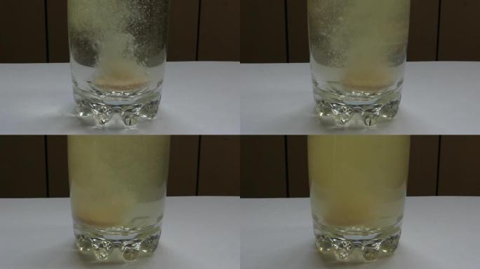 泡腾片在一杯水中气泡