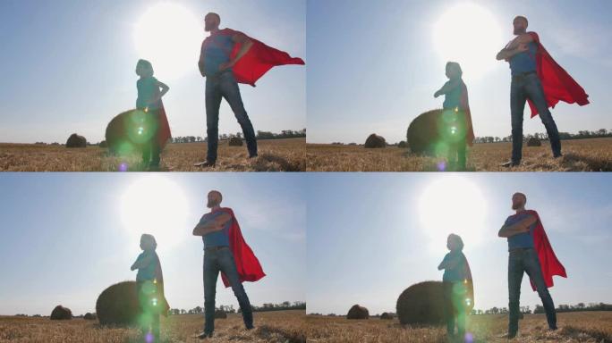 爱玩的爸爸和儿子打扮成超人在户外