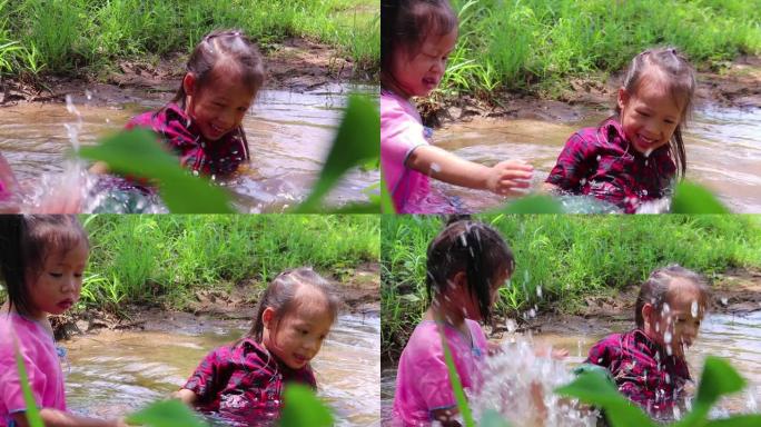 孩子们在溪水中赤脚玩耍，玩泥沙。