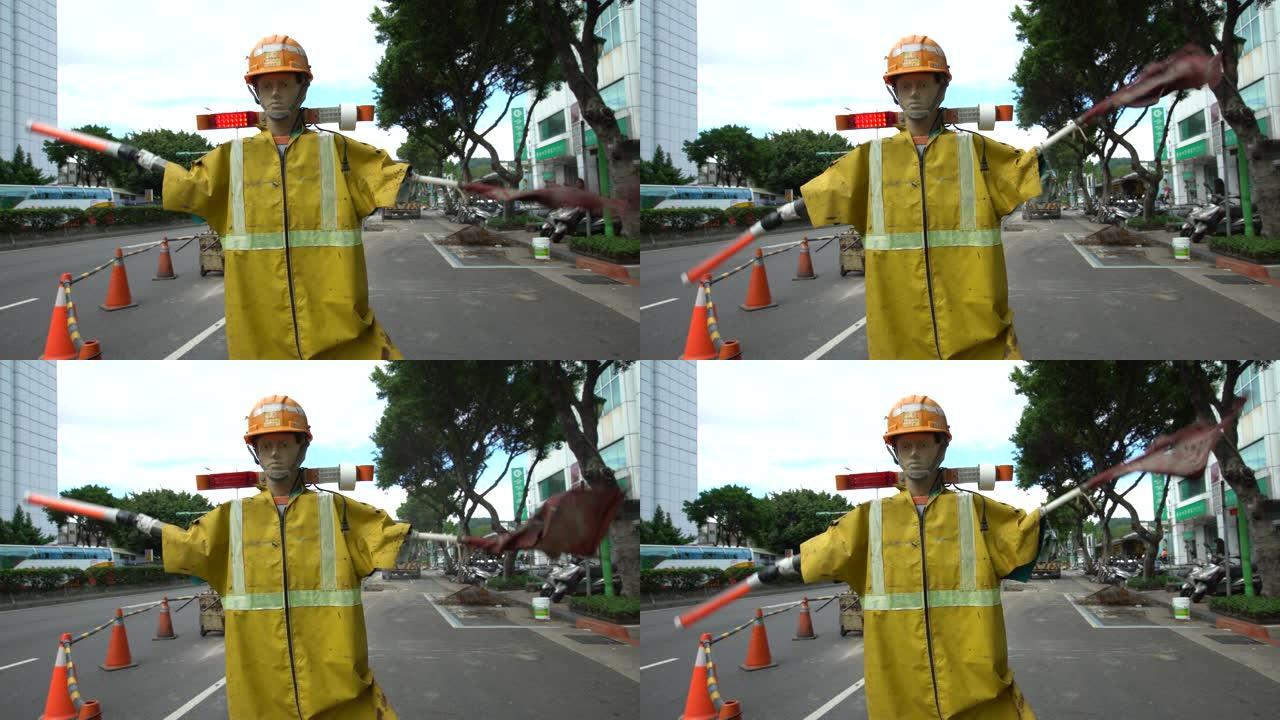 台北街头带电动旗手的4k台湾道路安全假人