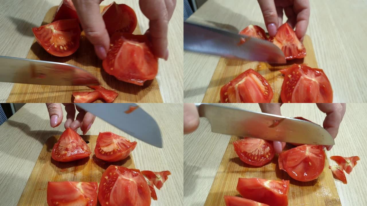 家庭主妇用木板上的刀切有机番茄