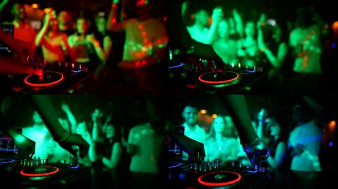 女性DJ手在转盘上混合，年轻人在背景中跳舞。当她打破节奏时，迪斯科俱乐部已经满了