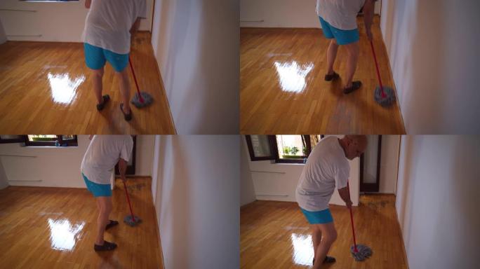 成熟的男人在家清理新粉刷的房间库存视频