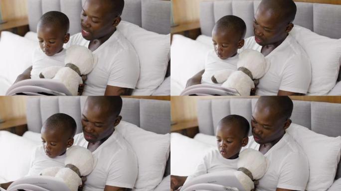 快乐的爸爸给他的孩子讲睡前故事