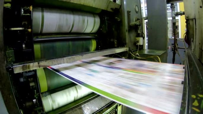 卷筒纸胶印机印刷报