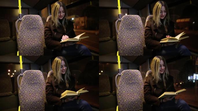 晚上乘公共汽车旅行的女乘客看书。晚上，女孩在窗户旁边的行驶车辆上读故事