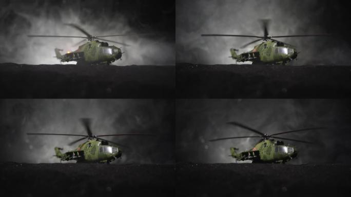准备从冲突地区起飞的军用直升机的轮廓。装饰夜景，直升机从沙漠开始，雾蒙蒙的背光。选择性聚焦。战争概念
