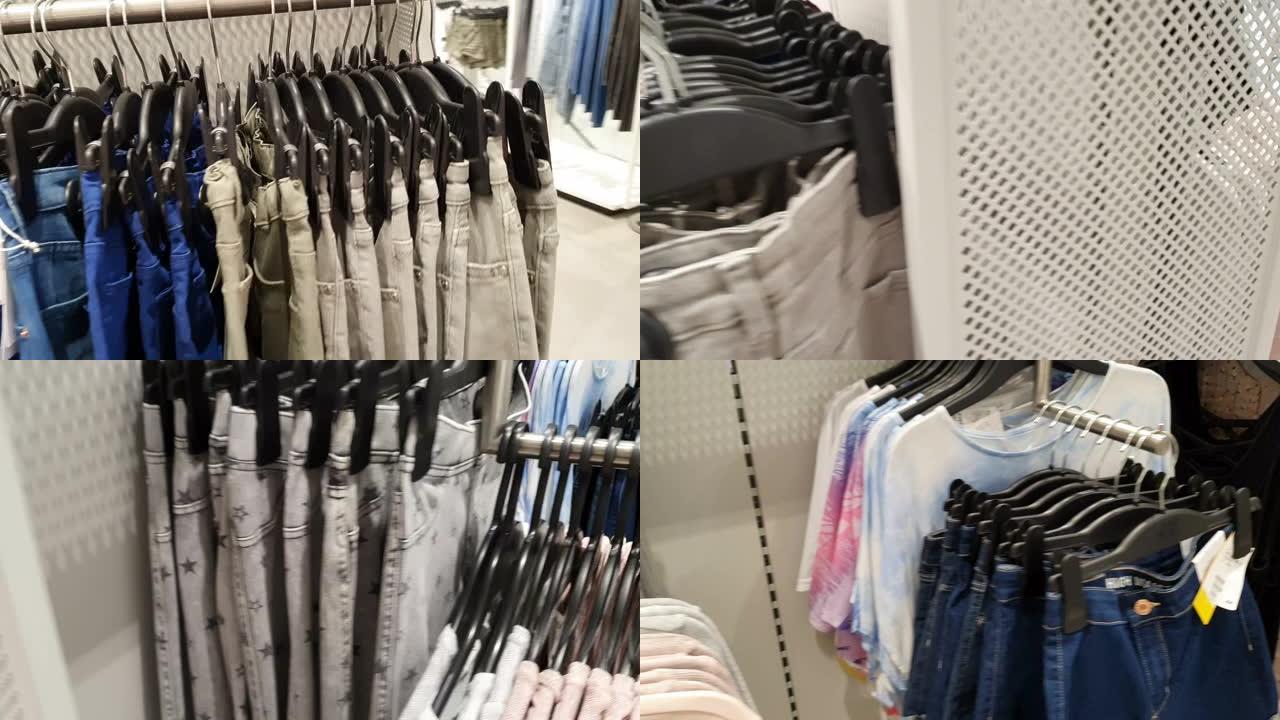 女人在购物中心选择衣服
