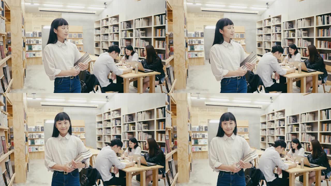 一位可爱的年轻亚洲女学生站在书店的肖像