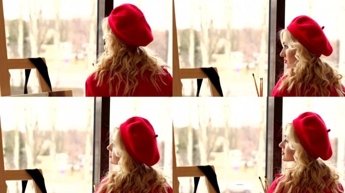 一个穿着红色贝雷帽的女孩的特写镜头，一件红色的连衣裙，在大窗户附近有红色的嘴唇。