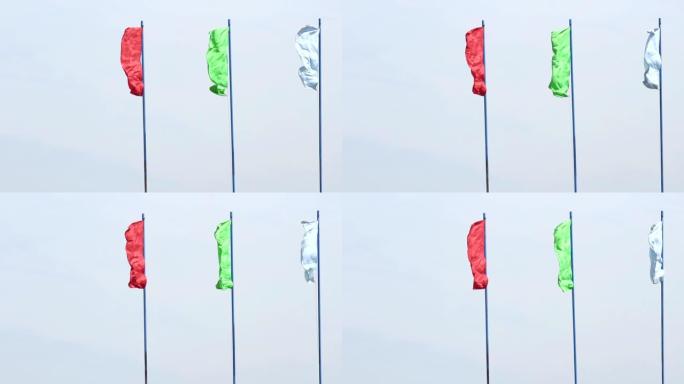 五彩的节日旗帜在蓝天下随风演变，背景，节日，慢动作，复制空间