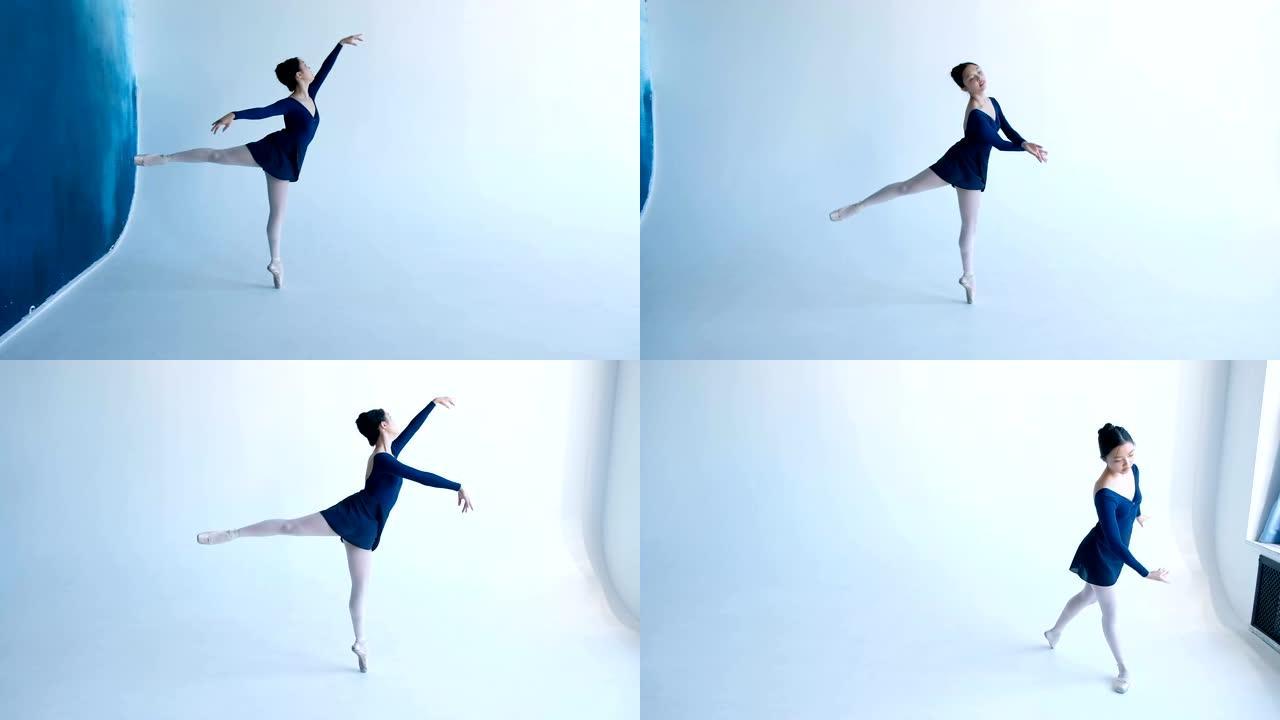 专业的年轻芭蕾舞演员在慢动作的白色背景上跳舞