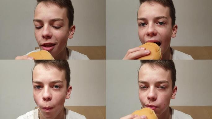 青少年男孩吃汉堡包，特写