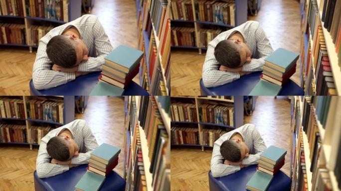 学生从乏力在图书馆睡着了
