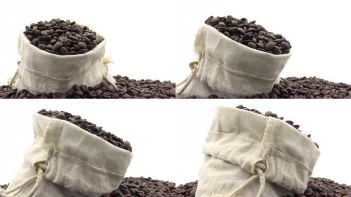 4k一袋烤咖啡豆在白色背景上旋转