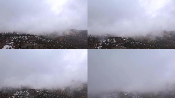 Troodos山奥林匹斯山附近雪雾公路的航拍画面