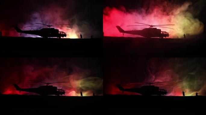 准备从冲突地区起飞的军用直升机的轮廓。装饰夜景，直升机从沙漠开始，雾蒙蒙的背光。选择性聚焦。战争概念