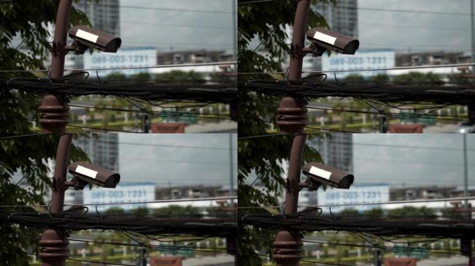 4k镜头，专栏上的闭路摄像机 (CCTV)，用于检查城市交通。