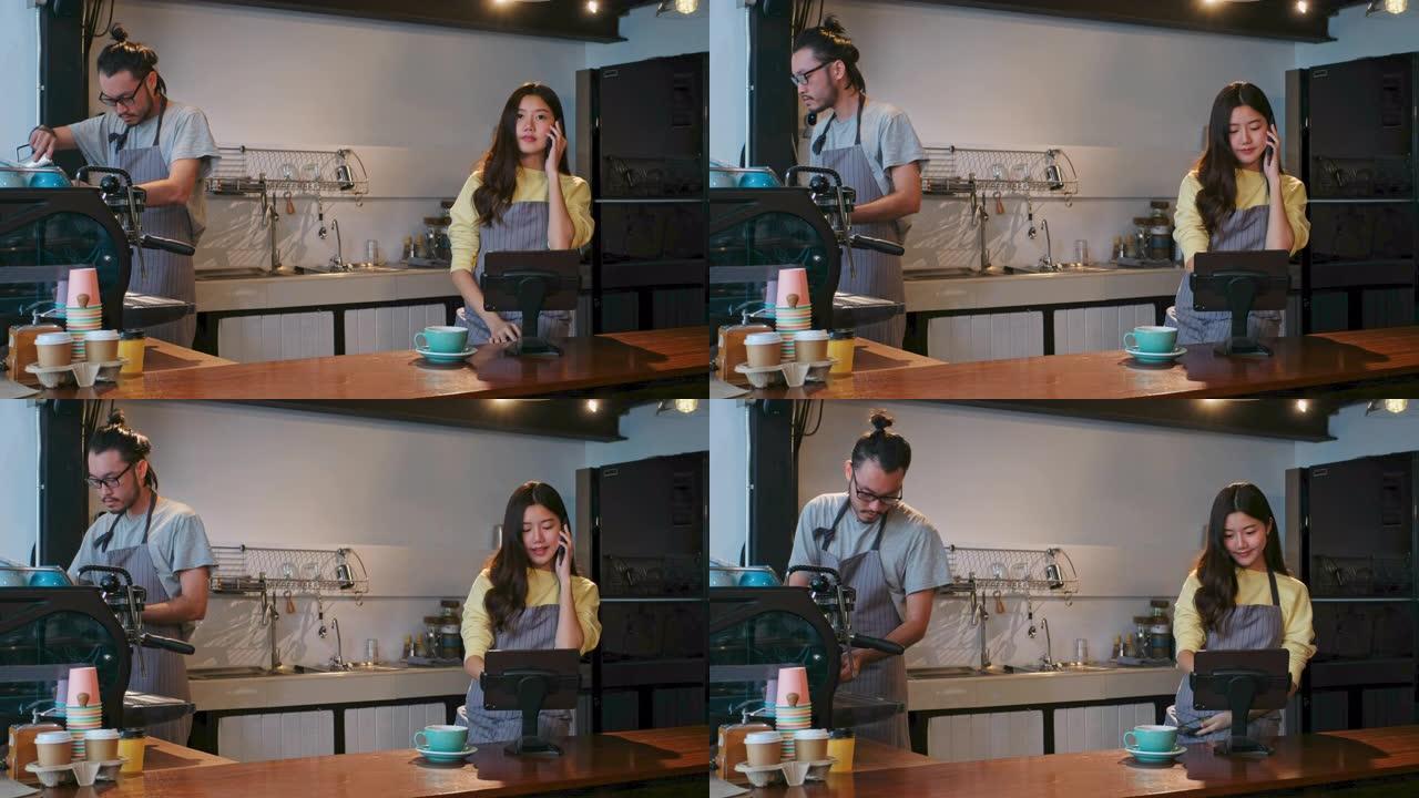 年轻的亚洲女性咖啡师，女服务员，小企业主在咖啡店咖啡馆柜台用数字平板电脑打电话点菜背景