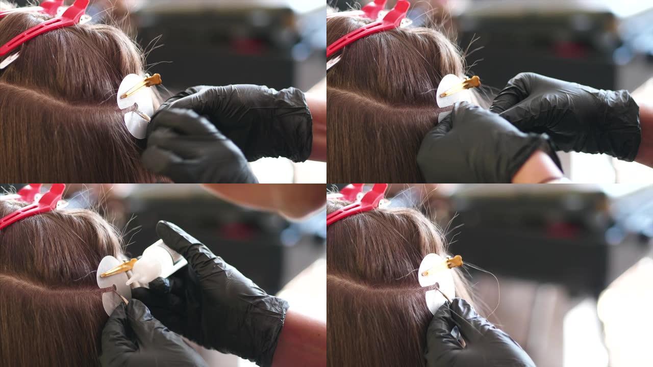 美发师正在安装头发延伸的升级。