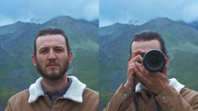 垂直拍摄PORTTAIT: 男性旅行者摄影师为博客制作专业山脉图片。一个留着长发，留着胡须的家伙手里