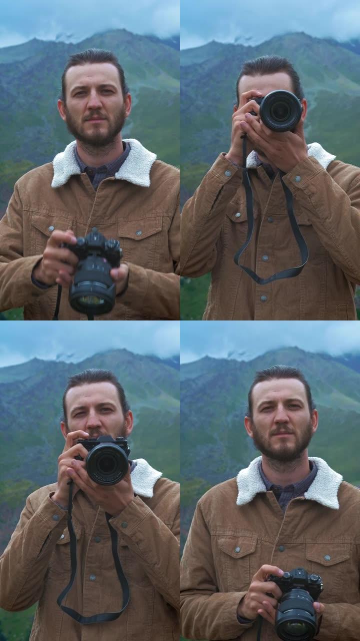 垂直拍摄PORTTAIT: 男性旅行者摄影师为博客制作专业山脉图片。一个留着长发，留着胡须的家伙手里