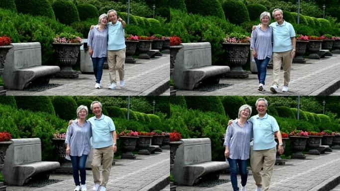 老年夫妇在公园散步时牵手