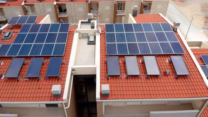 在建筑物的太阳能板上飞行。环境、能源