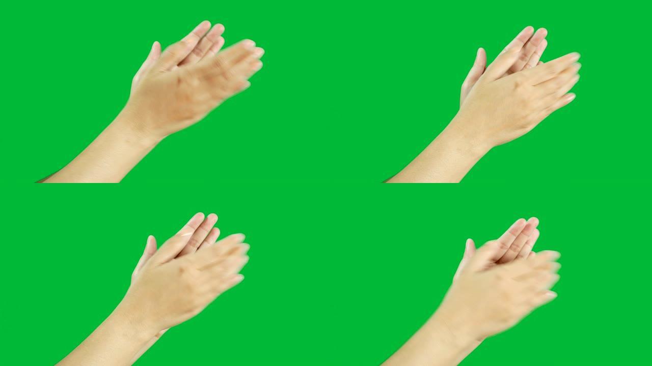 4K.女人双手缓慢鼓掌，掌声孤立在色度键绿色屏幕背景上