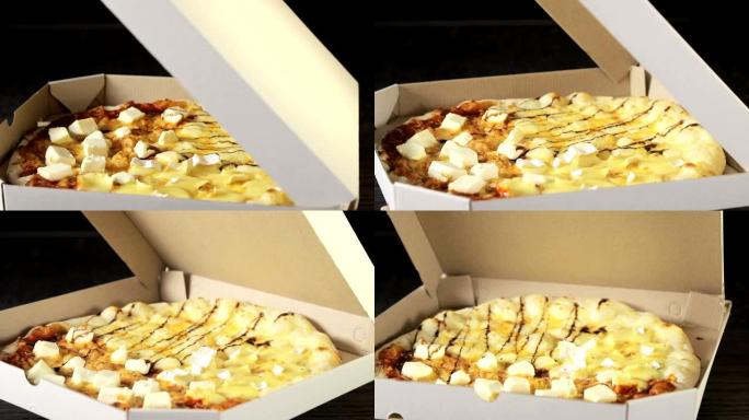 比萨饼的原始计划的四个奶酪，这是在包装，旋转自己。