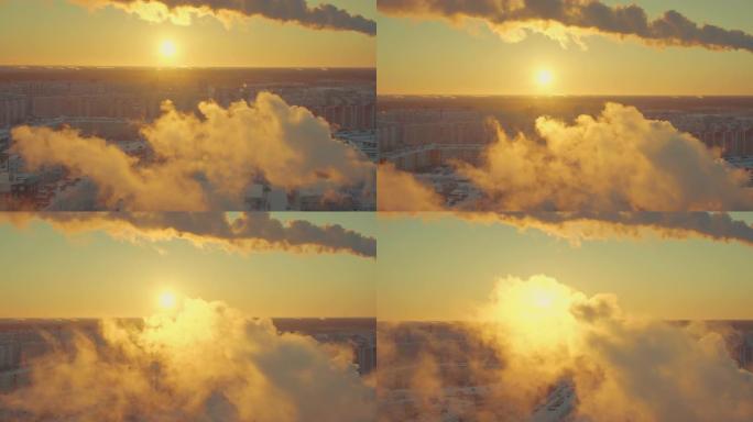 在冬季城市，寒冷的空气中升起多云的烟雾。蒸汽从管道中喷出。