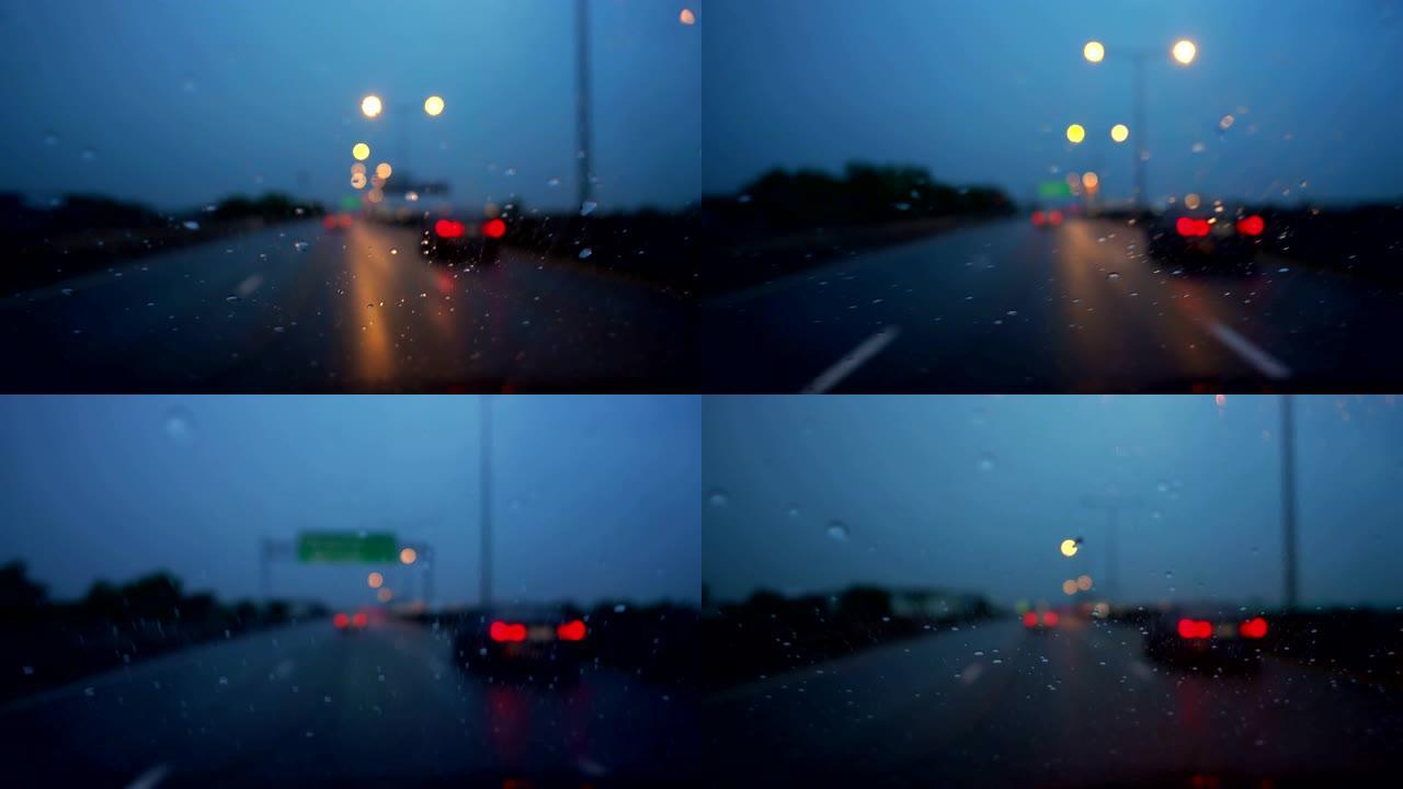 在漆黑的雨夜开车，手持。