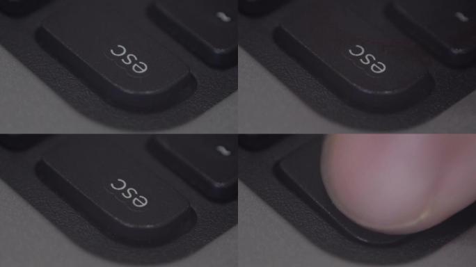 手指按下计算机键盘上的键的特写镜头