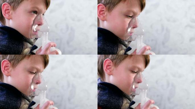 生病的男孩通过吸入器面罩吸入，面部特写侧视图。使用雾化器和吸入器进行治疗。