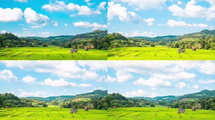 泰国炎热的夏日，4k延时拍摄在晴朗的蓝天中移动的白云，阳光穿过山脉，稻田和小小屋