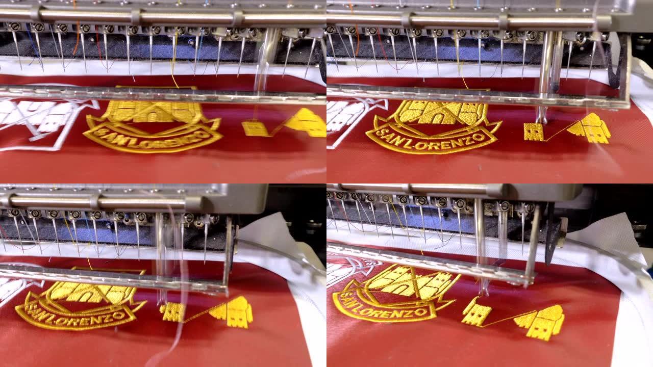 自动缝纫机将锦旗缝在红色衬衫上