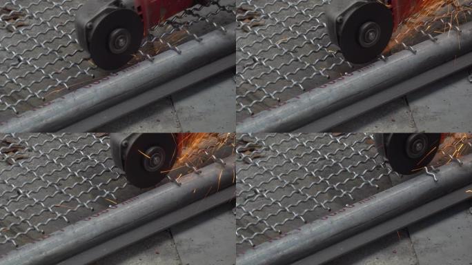 人用角磨机无盖护板切割金属网制作鸟笼。