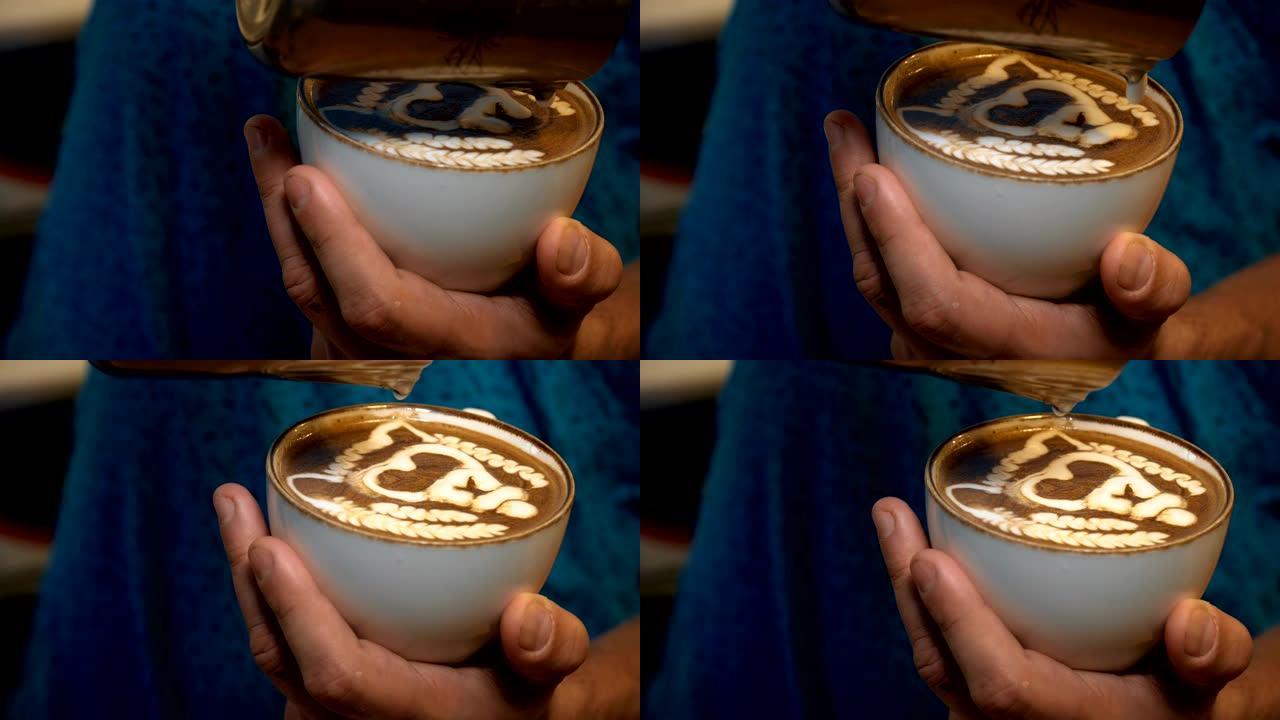 咖啡师将牛奶泡沫倒入拿铁咖啡杯中。制作拿铁艺术。