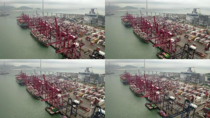 在香港维多利亚港乘起重机运往港口。鸟瞰图无人机4k镜头。