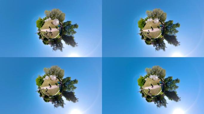 公园里zorb balls的人们的360景色