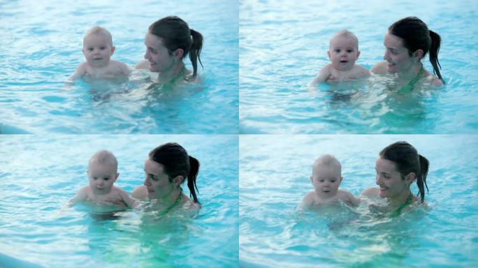 可爱的小男孩，在室外游泳池快乐地游泳，冬天，温泉游泳池，泼水