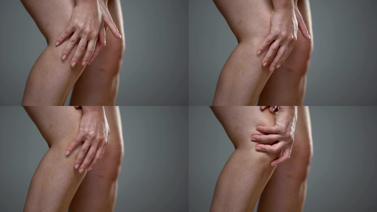 熟女触摸膝盖，半月板炎症，关节问题