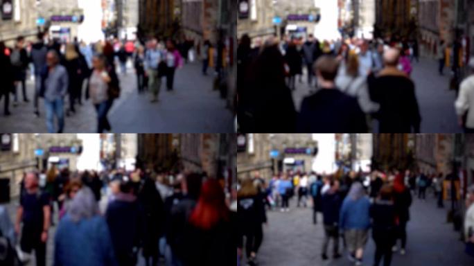 匿名的焦点人群在普通的英国城市中行走