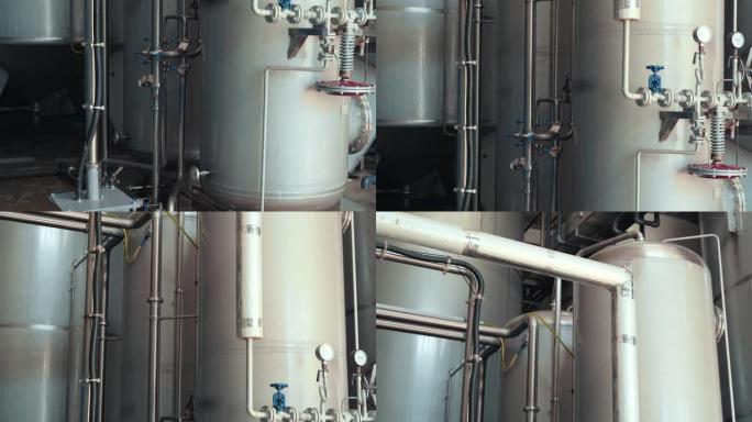 饮用水工厂或工厂生产，工业内部。大型金属罐，用于从井中过滤和饮用水处理