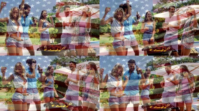 一群朋友在野餐和一面美国国旗为7月4日。
