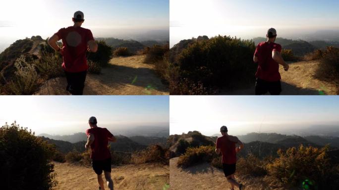 一个男人在哈利伍德 (Hallywood) 上方的山丘上进行早晨锻炼