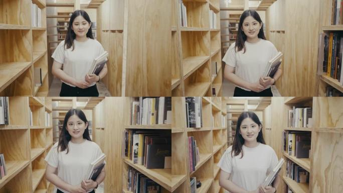 一个可爱的年轻亚洲女学生在书架之间行走的肖像 (慢动作)