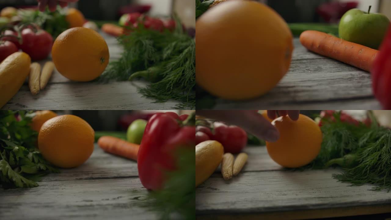 庄稼人在新鲜蔬菜中移动橘子